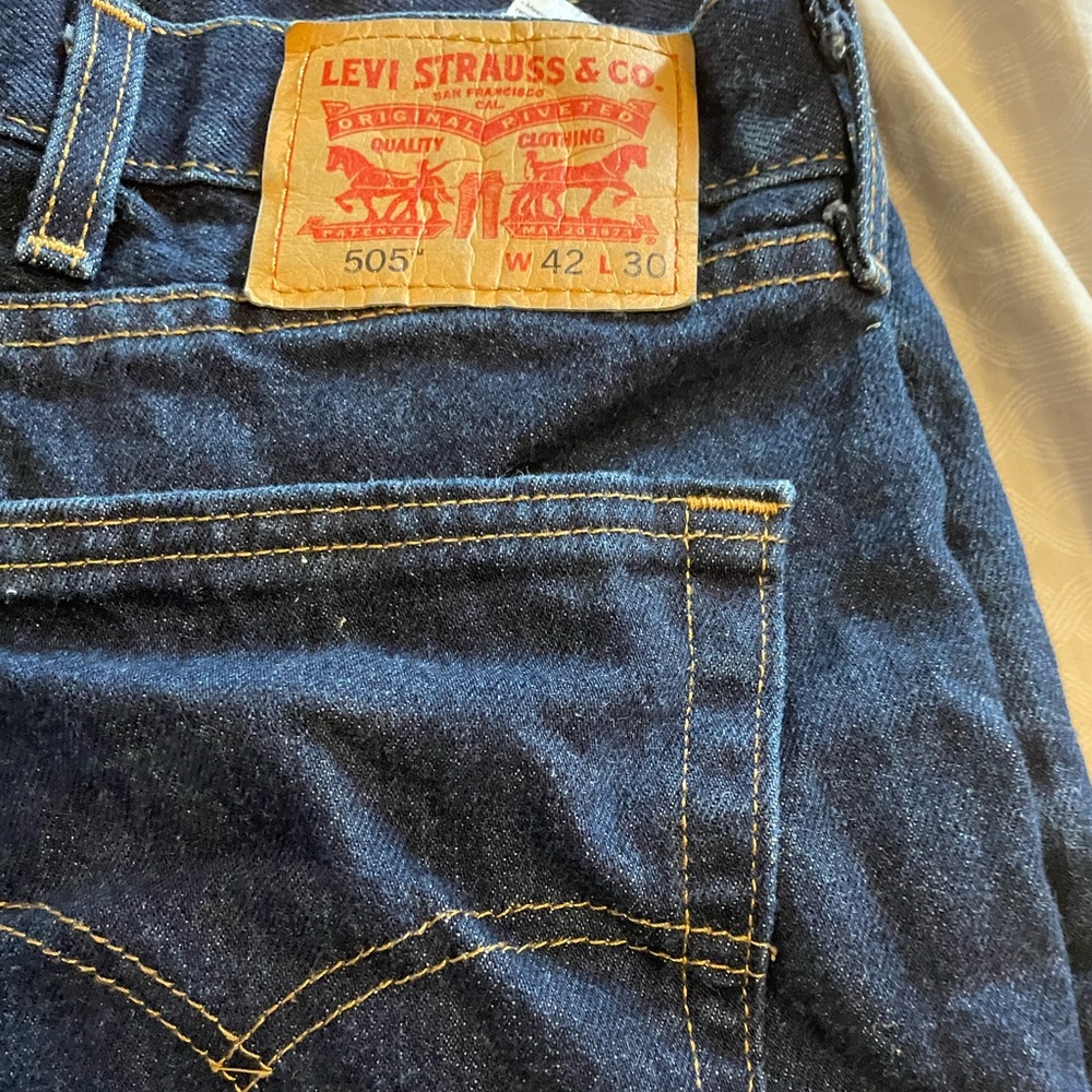 Practically new men’s Levi 505 dark blue jeans 42 x 30